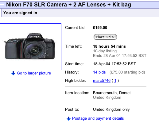 The eBay auction page for an item. The item is Nikon F70 SLR Camera+2 AF Lenses+Kit bag and an image is shown (with a link to a larger picture). Details shown are- Current bid- £155.00 (with a button to Place Bid); Time left- 18 hours 54 mins / 10-day listing / Ends 28-Apr-04 17-53-52 BST; Start time- 18-Apr-04 17-53-52 BST; History- 14 bids [link] (£75.00 starting bid); High bidder- marc5746 [link] (1); Item location- Bournemouth, Dorset, United Kingdom; Post to- United Kingdom only; Postage and payment details [link].